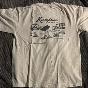 Kanpai Graphic T-Shirt in White
Kid Goku taking a leak